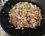 Foto del paso 5 de la receta: Arroz meloso de piquillos confitados y costillas de cerdo