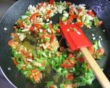 A picture of step 4 of Our Family Recipe for Mixed Paella.