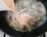 A picture of step 1 of Achar gosht.