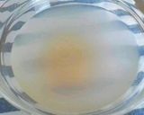 A picture of step 2 of Apple Jello--Looks Like a Glass of Beer.