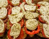 A picture of step 8 of Pesto, Tomato, & Mozzarella Baked Chicken.