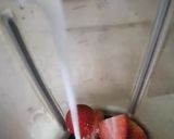 A picture of step 2 of Strawberry Lassi🍓🍓.
