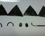 A picture of step 1 of Character Bento Omusubiman.