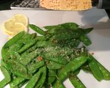 A picture of step 5 of Garlic Snow Peas With Lemon Zest and Parmesan.