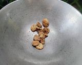 A picture of step 1 of Red Amaranth Dry Curry.