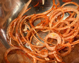 A picture of step 2 of String onion rings.