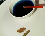 A picture of step 3 of Homemade Blue Curacao syrup.