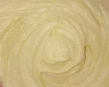 A picture of step 2 of Vanilla cake with chocolate frosting.