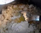 A picture of step 4 of Olive Gardens Chicken & Gnocci Soup.