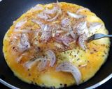 A picture of step 2 of Onion Omelette.