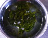 A picture of step 1 of Enoki and Wakame Miso Soup.