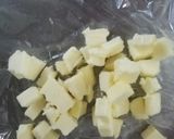 A picture of step 1 of Rich & Cheesy Baked Cheesecake.