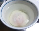 A picture of step 2 of Poached Eggs in the Microwave.
