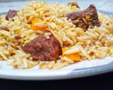 A picture of step 6 of Brown jollof rice.