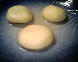 A picture of step 3 of Kyoto White Miso Ozouni (Mochi Rice Cake Soup for New Years).