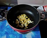 A picture of step 6 of Bashonti Pulao r Chicken Kosha.