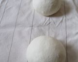A picture of step 2 of Fluffy Powdered Snow Christmas Bread Wreath.