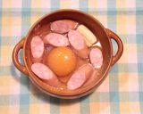 A picture of step 4 of Microwave Sloppy Egg & Wiener Sausages.
