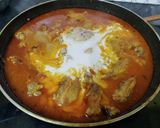 A picture of step 5 of Goan Chicken Curry.