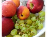 A picture of step 1 of Salad with peaches & green grapes.