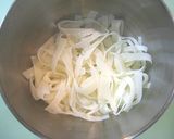 A picture of step 2 of Banquet Style Prawn Salad.