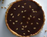 Une image de l'étape 23 de Tarte chocolat snickers.