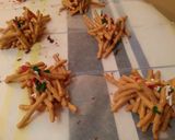 A picture of step 6 of Butterscotch & Peanut Butter Chinese Noodle "Spider" Cookies.