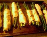 A picture of step 5 of asparagus in a blanket,with tarragon sause.