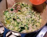 A picture of step 5 of Risotto with thick slices of zucchini.