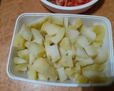 A picture of step 1 of Alu Dahi Pholki Chat.
