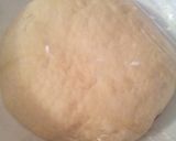 A picture of step 2 of Sunshine's homemade doughnuts / chocolate glaze.