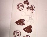 A picture of step 7 of Kabocha Squash Custard Puddings Decorated with Chocolate Characters for Halloween.