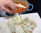 A picture of step 3 of Smokey tomato & halloumi bake.