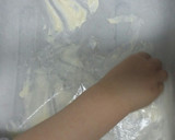 Foto del paso 3 de la receta: Brazo gitano de mermelada de fresa