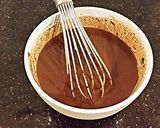 A picture of step 13 of Chocolate Pumpkin Layer Cake.
