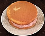 A picture of step 9 of Cherry Vanilla Layer Cake.