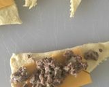 A picture of step 4 of Cheeseburger Crescent Rolls.
