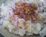 A picture of step 4 of Aalu Paranttha (potato stuff brush fried bread).