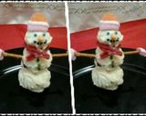 A picture of step 11 of Ladybirds Christmas Snowman and Christmas Pudding Truffles.