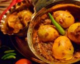 A picture of step 14 of ডিম কষা.