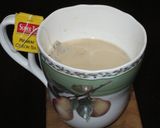 A picture of step 7 of Piping Hot! Honey and Ginger Milk.