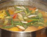 A picture of step 4 of Chicken Drumstick Cazuela.
