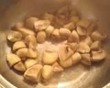 Foto del paso 7 de la receta Solomillo de cerdo con champiñones y cebolla caramelizada