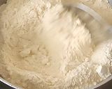 A picture of step 2 of Oats Carrot Idli.