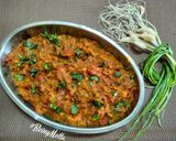 A picture of step 8 of Baigan Bharta/ Ringna No Olo sabzi.