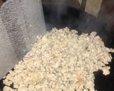A picture of step 2 of Tawa chicken with onion.
