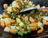 A picture of step 10 of Malabar Mixed Vegetable Kurma.