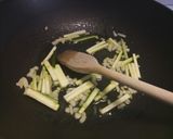 A picture of step 1 of Linguine with prawns, courgette & pumpkin flowers.