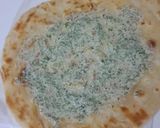 A picture of step 9 of Tikka roll paratha.