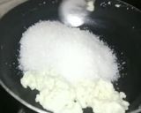 A picture of step 2 of Coconut burfi using milk powder.